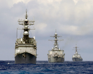 USS Thorn (DD 988), USS Cole (DDG 67), and the USS Gonzalez (DDG 66), members of the Enterprise Carrier Strike Group, perform divisional tactics while underway in the Atlantic Ocean